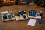 Example builds from the ESP32 Beginner Kit: a digital kitchen scale, a distance warning system and an RFID access demo (illustrative image)