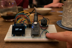Breadboard reaction timer game with OLED display, push button, buzzer and ESP32-C3