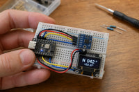 Digital compass and tilt display breadboard build with ESP32-C3 SuperMini, MPU6050 sensor, and OLED display showing heading